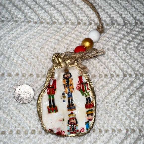 Two Handmade Decoupage Oyster Shell Christmas Ornaments (snowman, nutcrackers) - Picture 3 of 4